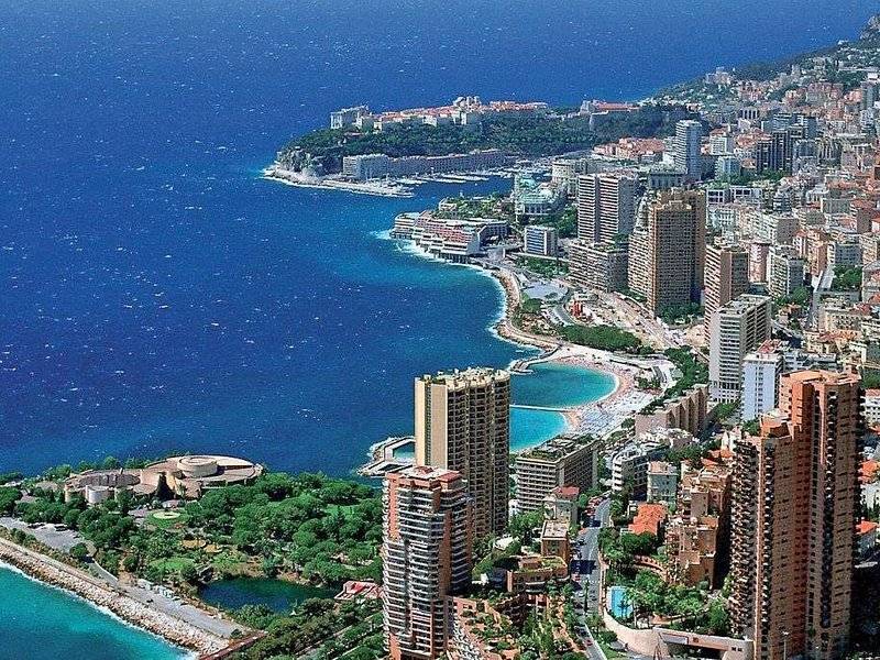 Monaco's towers and harbours along the coast, seen from above